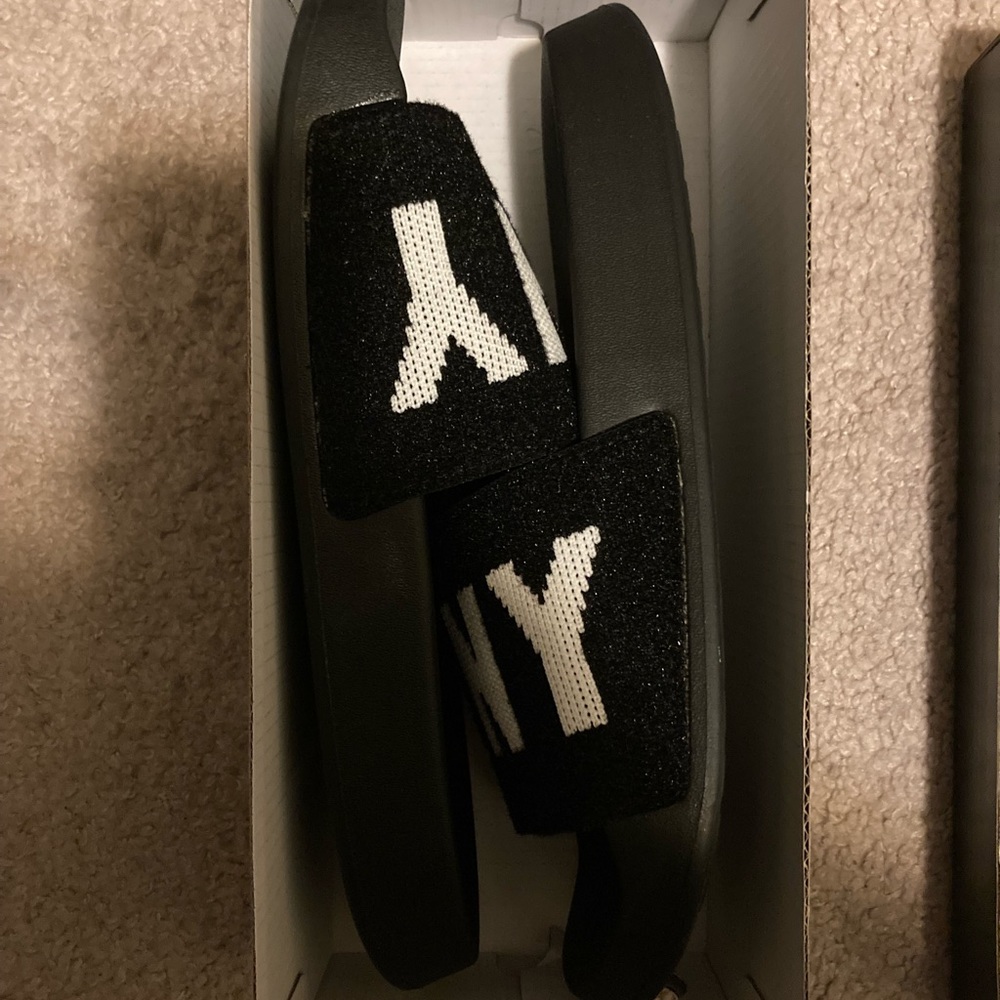 Brand new DKNY Slides, never worn in the box.